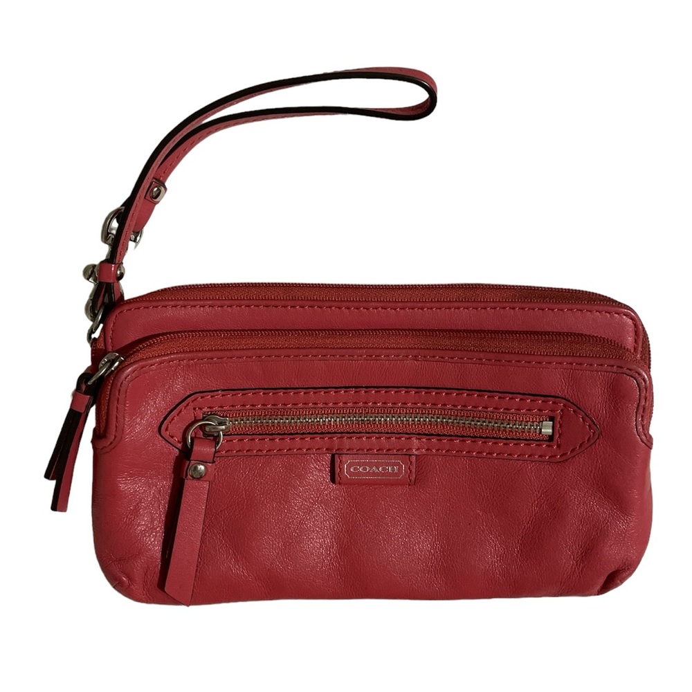 Coach salmon colored 3 zipper leather wristlet